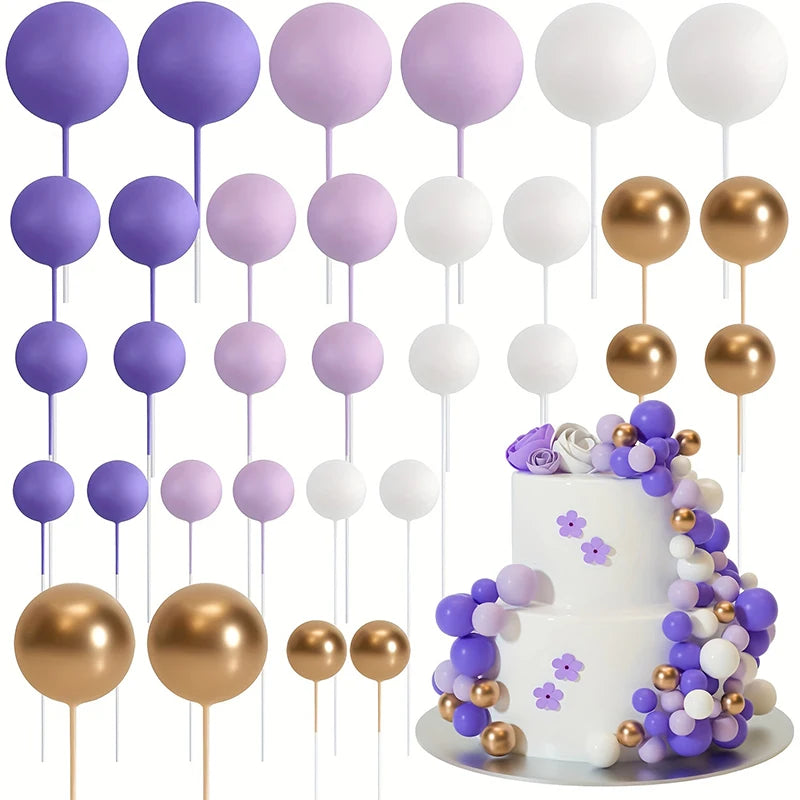 A set of 20 gold and purple ball cake toppers on sticks.