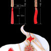 Two versions of an antique copper five emperor coin pendant with a Chinese knot, shown separately and together.