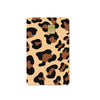 A card cover featuring a brown and black leopard print design with a gold-colored emblem.