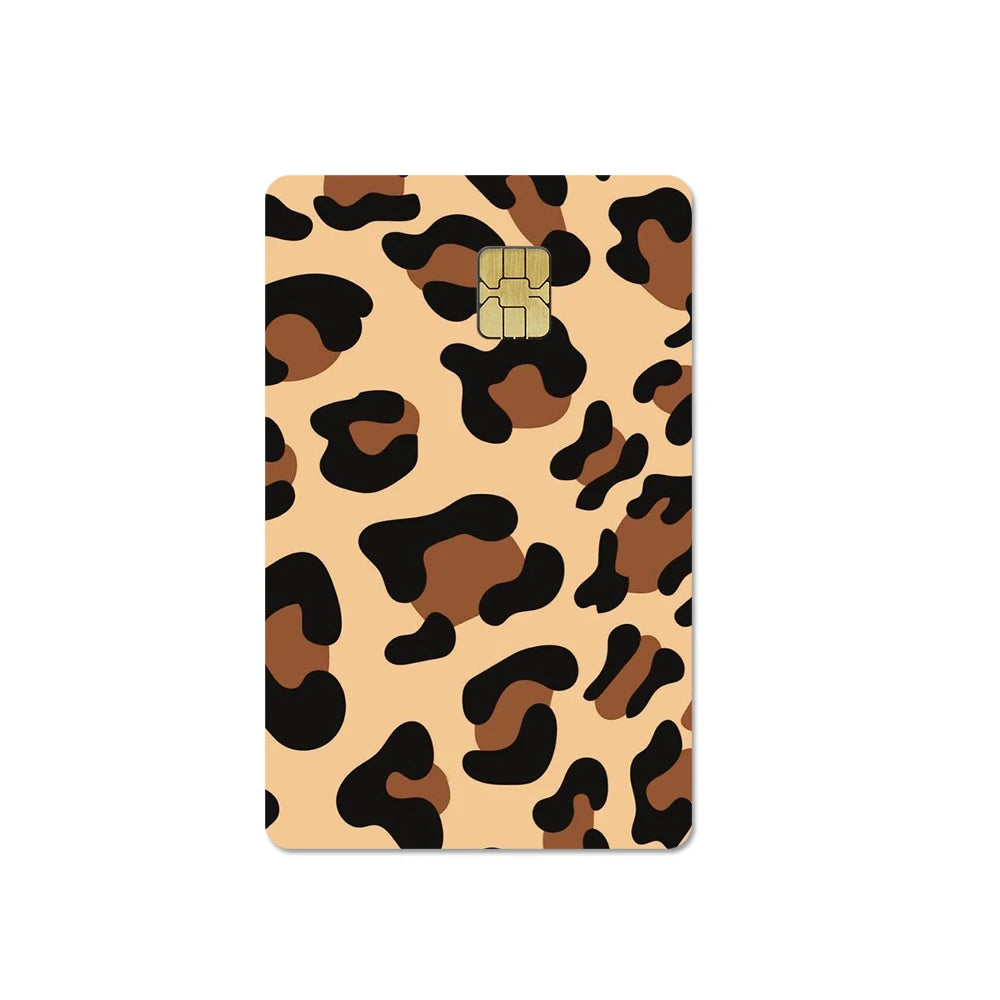 A card cover featuring a brown and black leopard print design with a gold-colored emblem.