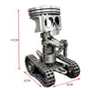 A silver mechanical piston skull sculpture with metal gears and a textured base.