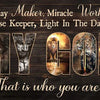 Wall art featuring a lion and warrior theme with inspirational text on a dark wooden background.
