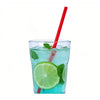 A glass of iced green beverage garnished with lime slices and mint, served with a red disposable straw.