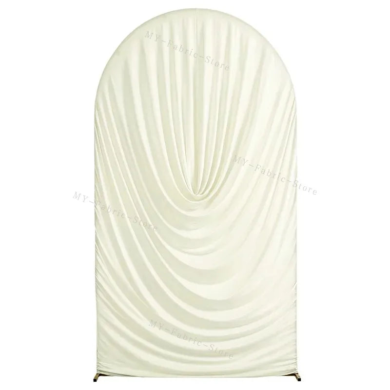 A cream-colored stretchy spandex arch cover draped in soft folds for weddings and events.