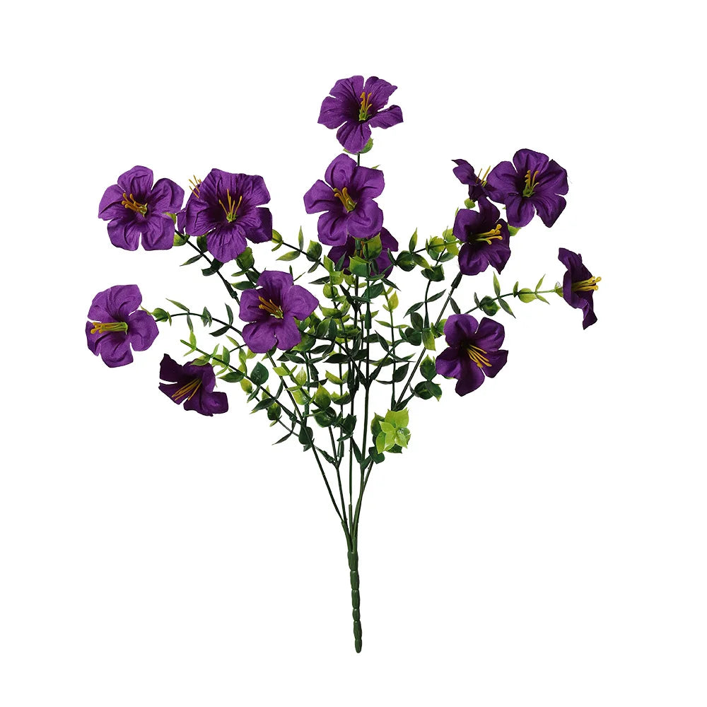 A bouquet of artificial silk purple flowers with green leaves.