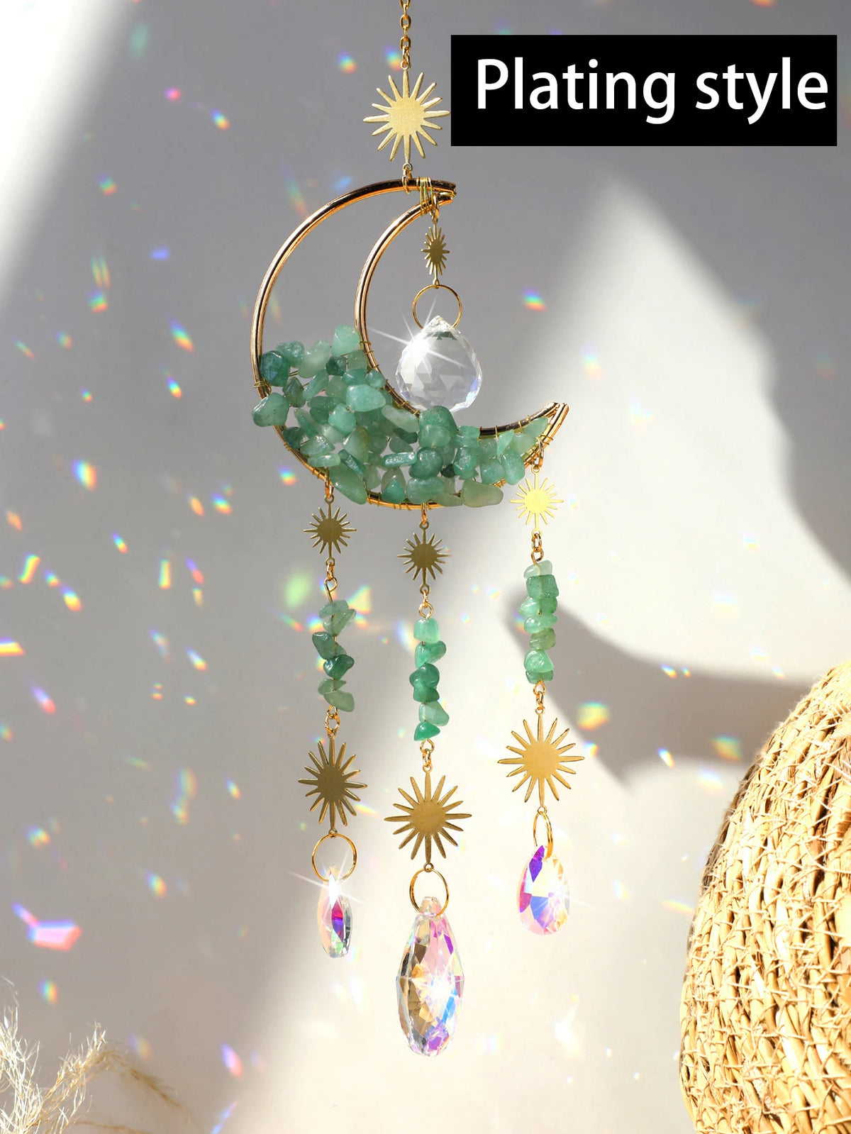 Handcrafted moon crystal suncatcher featuring a crescent moon and prism pendant with green crystals.