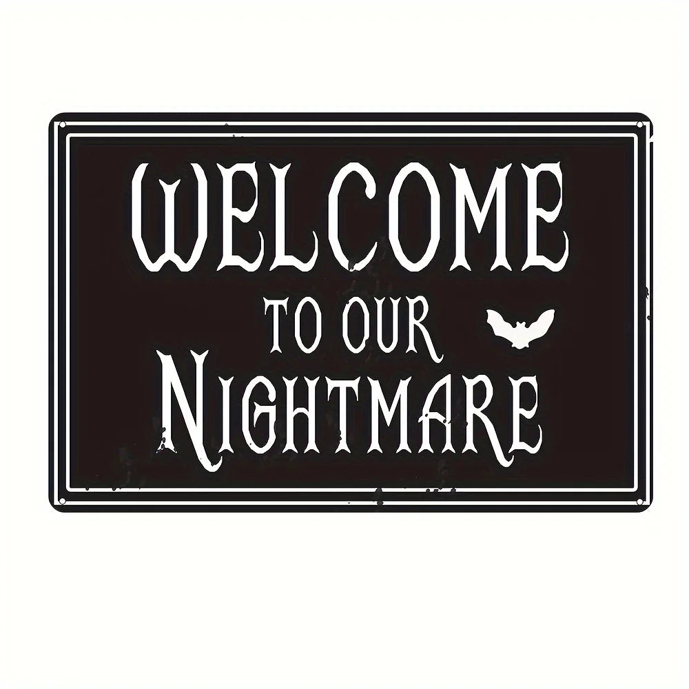 A black metal tin sign with white gothic lettering that reads Welcome to our Nightmare and features a silhouette of a bat.