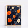 A framed canvas art print featuring a collection of black vinyl records with orange labels.