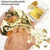 Hands are separating edible gold leaf flakes into powder for baking and cake decoration