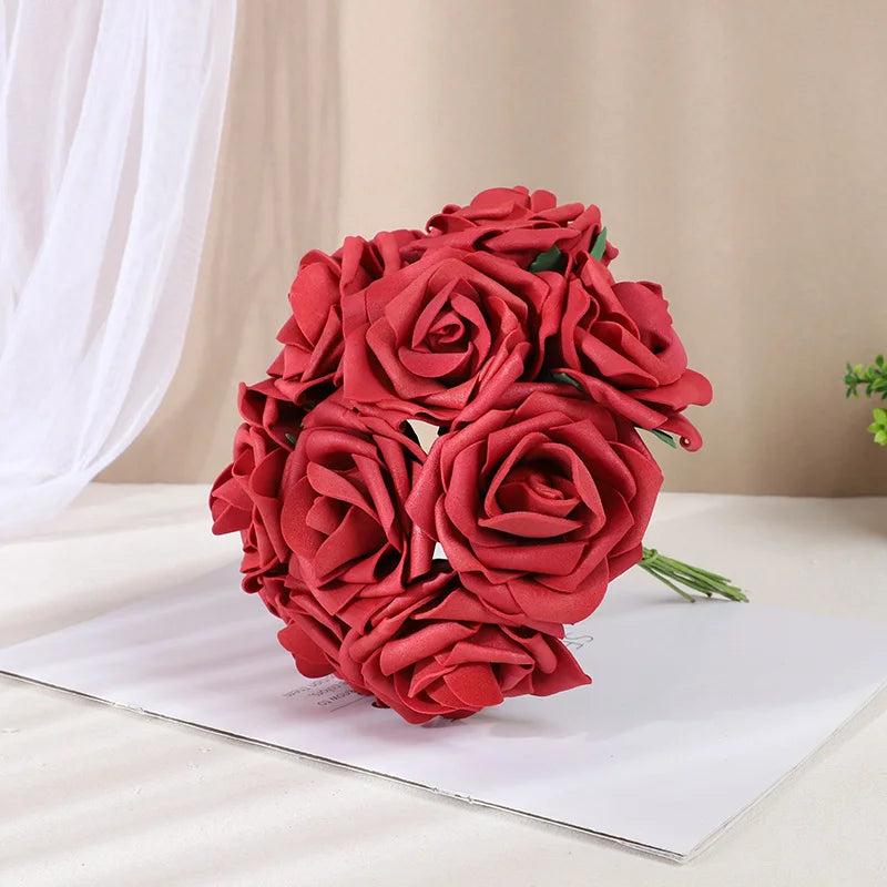 A bouquet of twenty deep red foam roses used for weddings and home decor