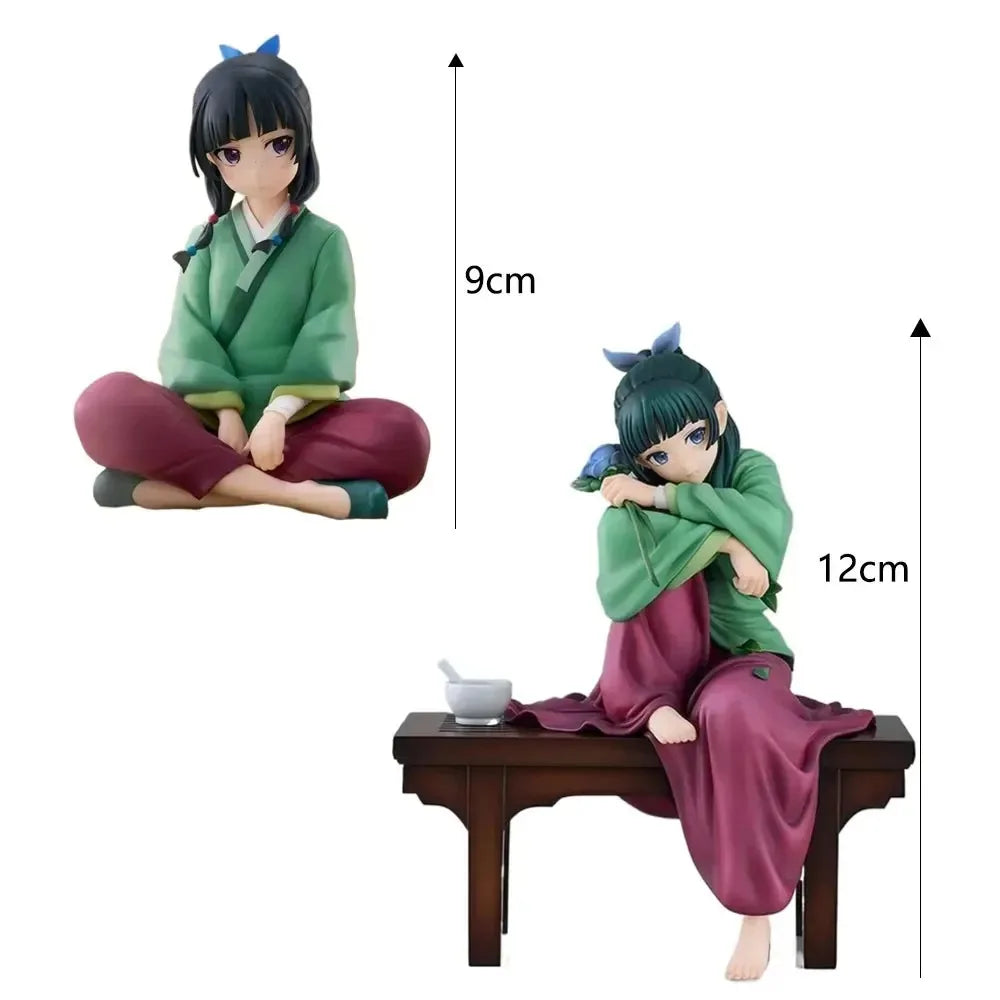 A collectible PVC figure of Maomao from The Apothecary Diaries, seated in a relaxed pose.