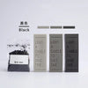 Three black glass candle containers labeled Light a candle to save time shown next to a color gradient bar.