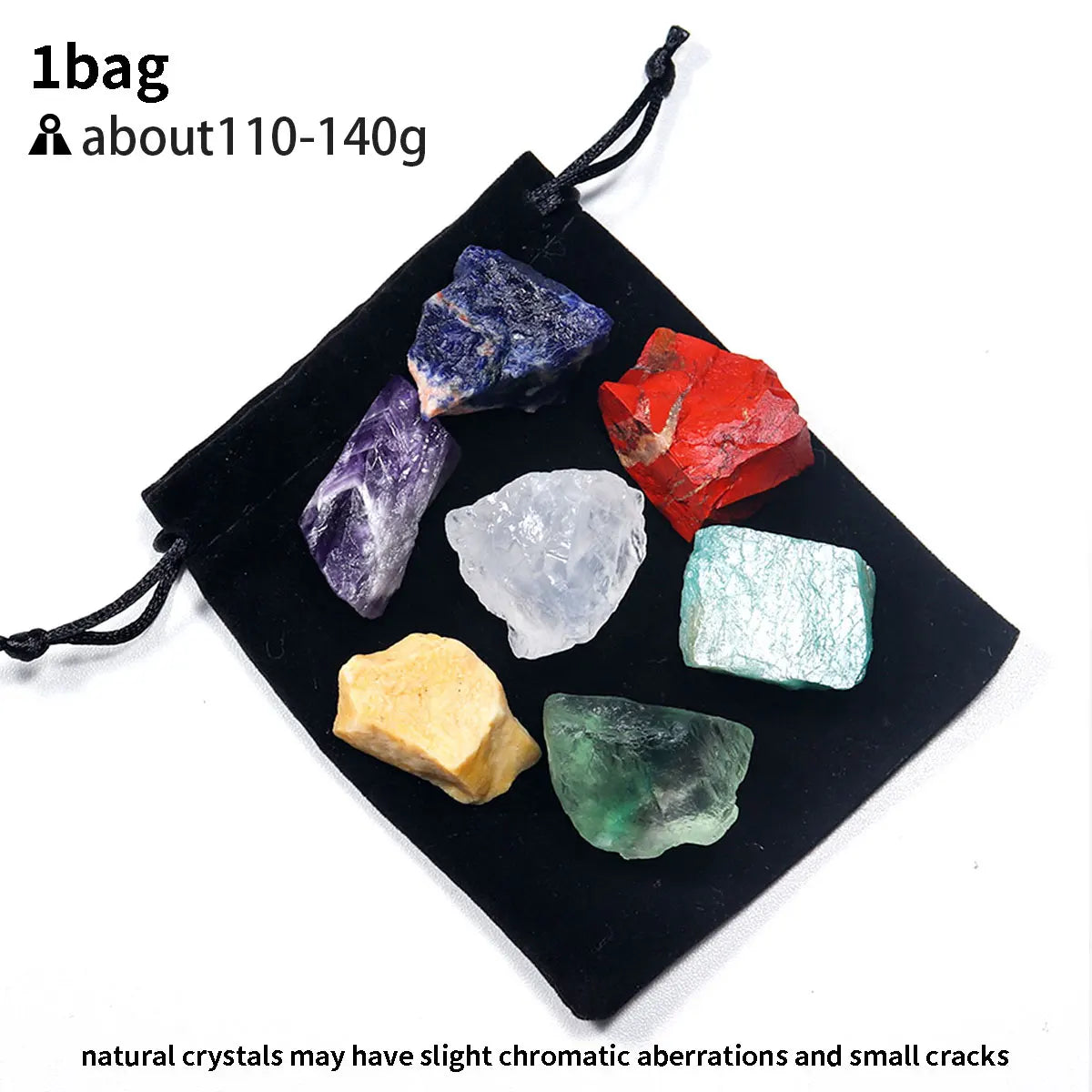 A set of natural crystals including purple, blue, red, white, and green stones displayed on a black fabric bag.