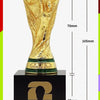 Gold-colored figurine of the FIFA World Cup trophy displayed on a black base.