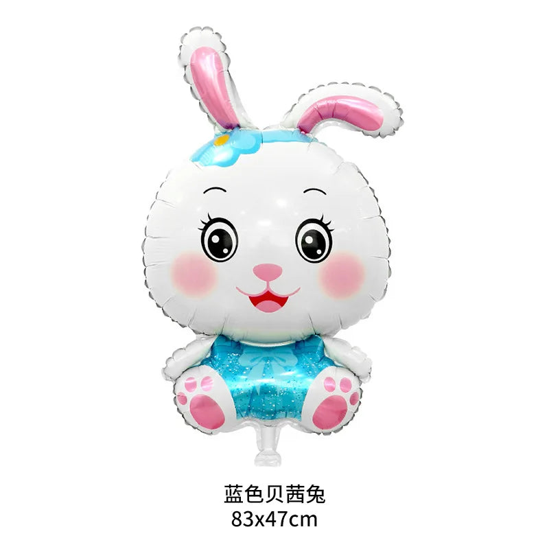 A white cartoon bunny foil balloon with pink ears and a blue bow.