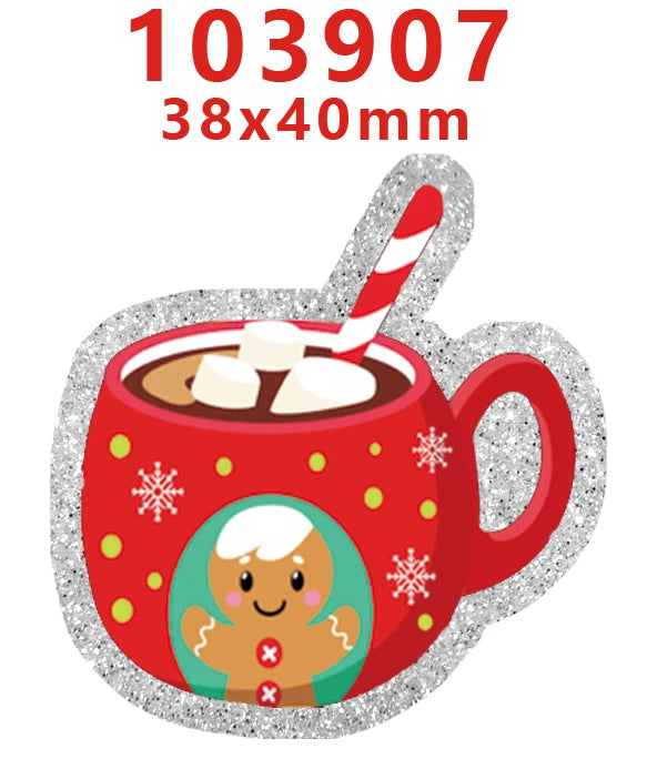 A red mug filled with hot chocolate and topped with whipped cream, surrounded by silver glitter acrylic charms.