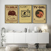 A display of three vintage French Exit TV Girl Lovers Rock wall art prints on a white shelf.