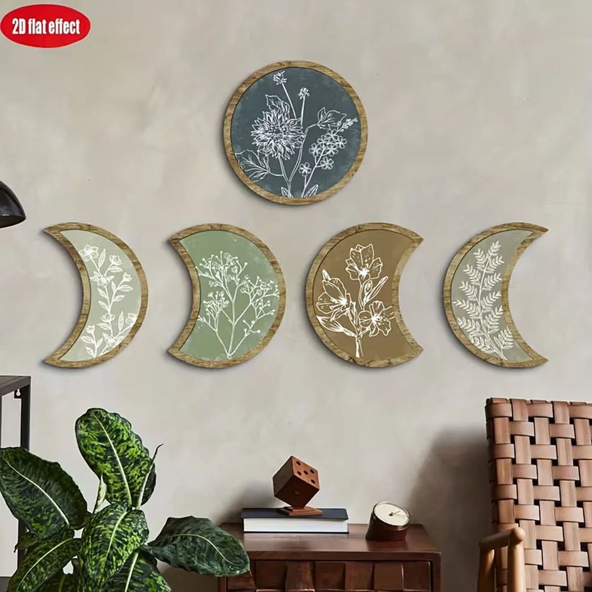 A set of five natural wood and white floral moon phase wall decorations mounted on a light gray wall.