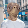 A realistic cute alien full-face latex mask with large eyes and a light brown skin tone.