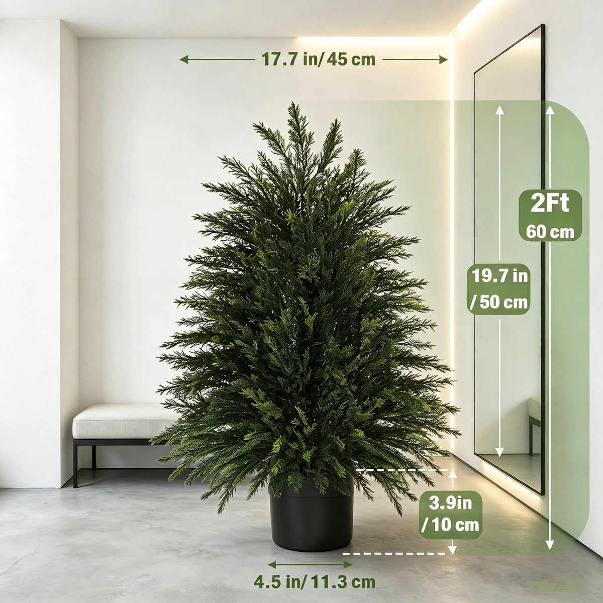 A tall artificial cedar topiary tree in a black pot displayed in a modern room.