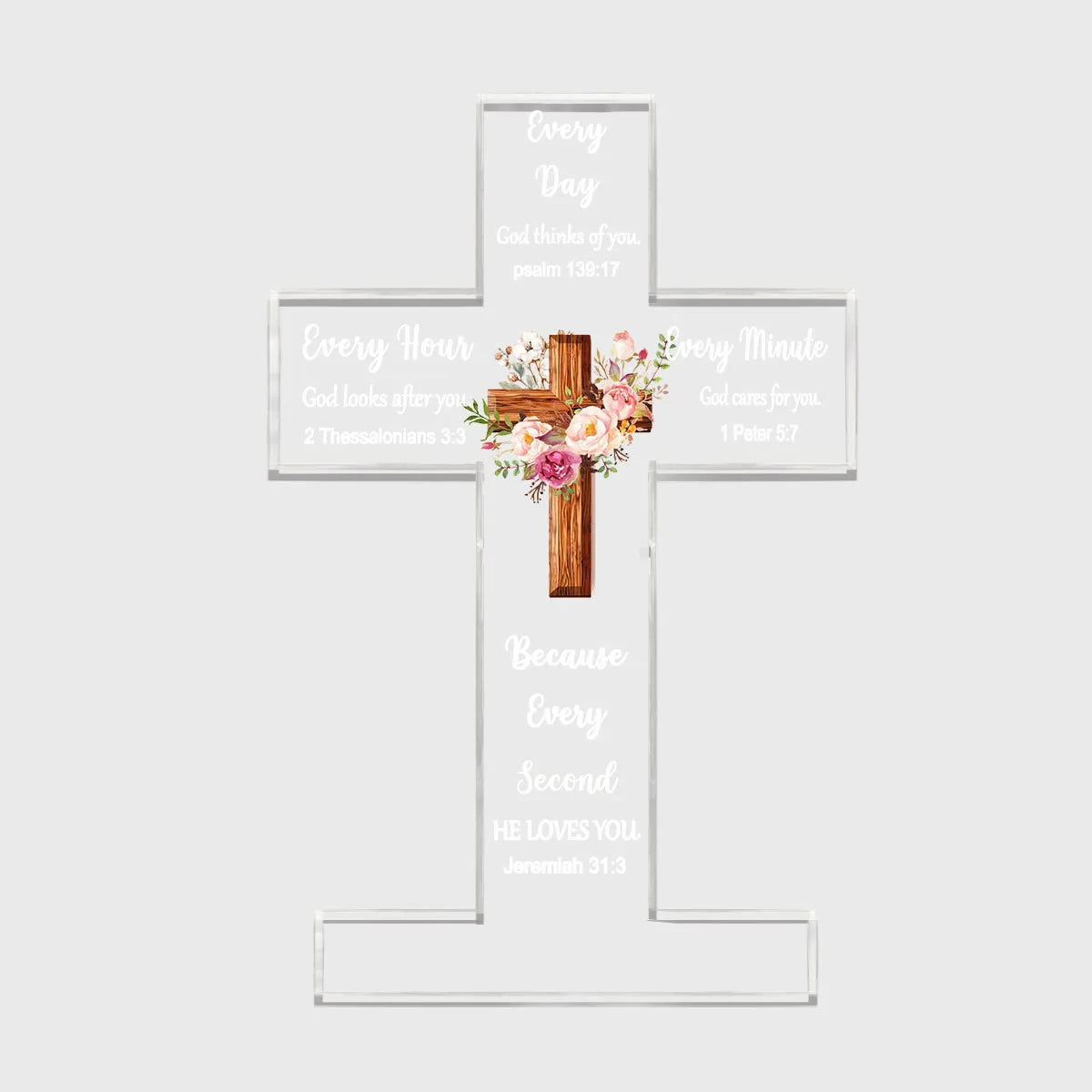 Clear acrylic cross with inspirational Bible verses engraved on the arms