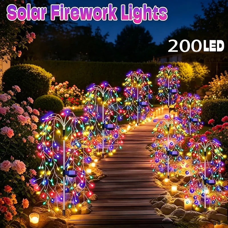Solar fireworks lights illuminating a wooden garden path with colorful LED starburst effects.