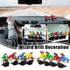 A collection of witch and wizard figurines used for dashboard drift decoration.