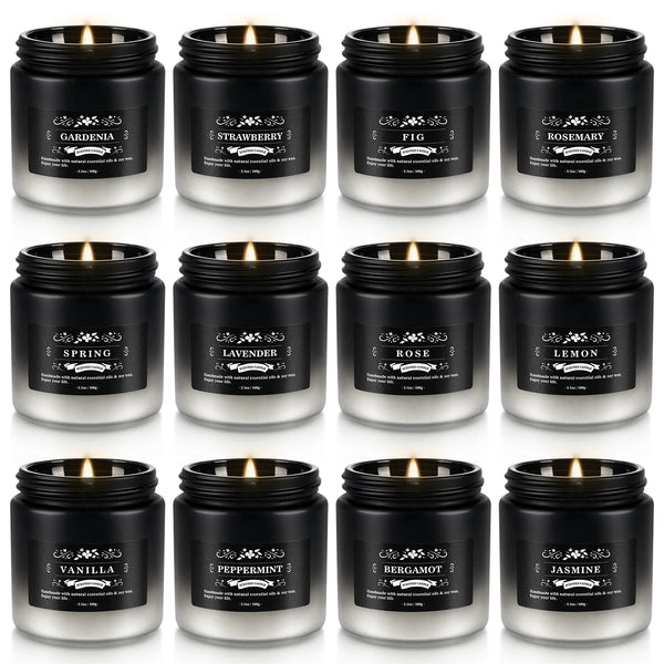 A collection of twelve gradient scented soy wax candles in black jars featuring scents like gardenia, strawberry, fig, rosema
