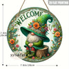 A handcrafted wooden garden gnome welcome sign featuring a green witch hat and beard surrounded by colorful flowers and folia