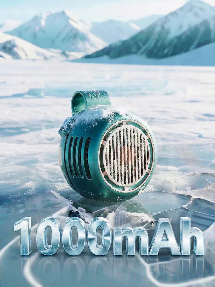 A teal portable bladeless clip-on fan rests on a frozen ice surface with snowy mountains in the background.