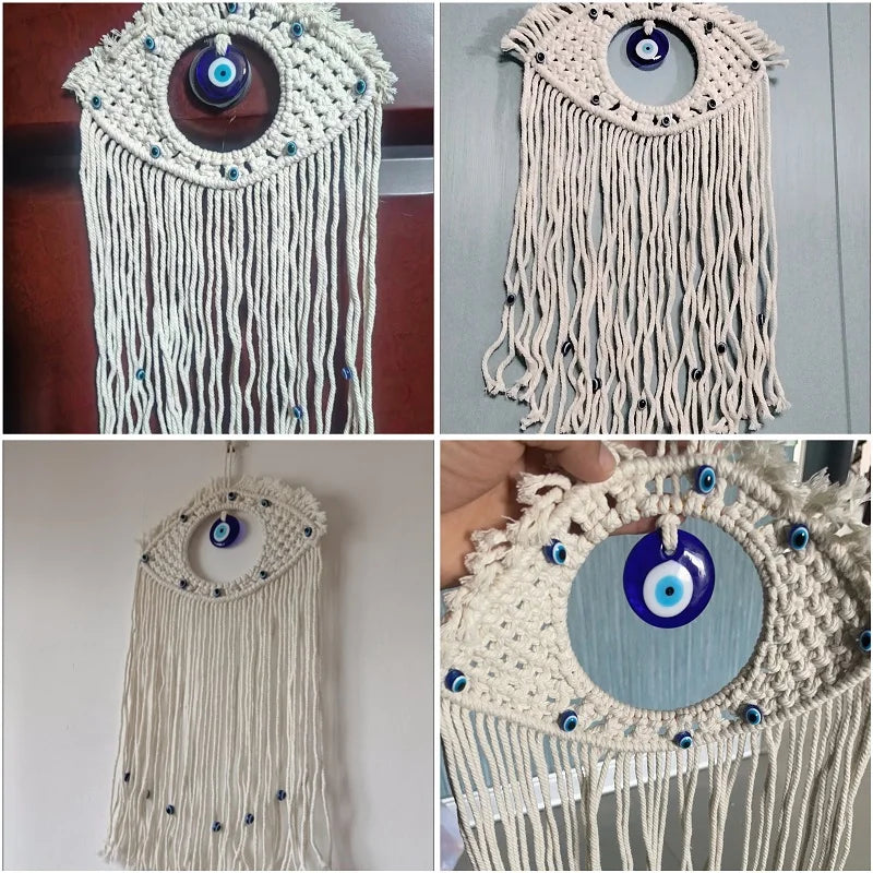 A macrame wall hanging featuring a white pendant with a blue evil eye and dangling threads.