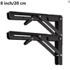 Black heavy-duty foldable wall-mounted shelf brackets for supporting a shelf.