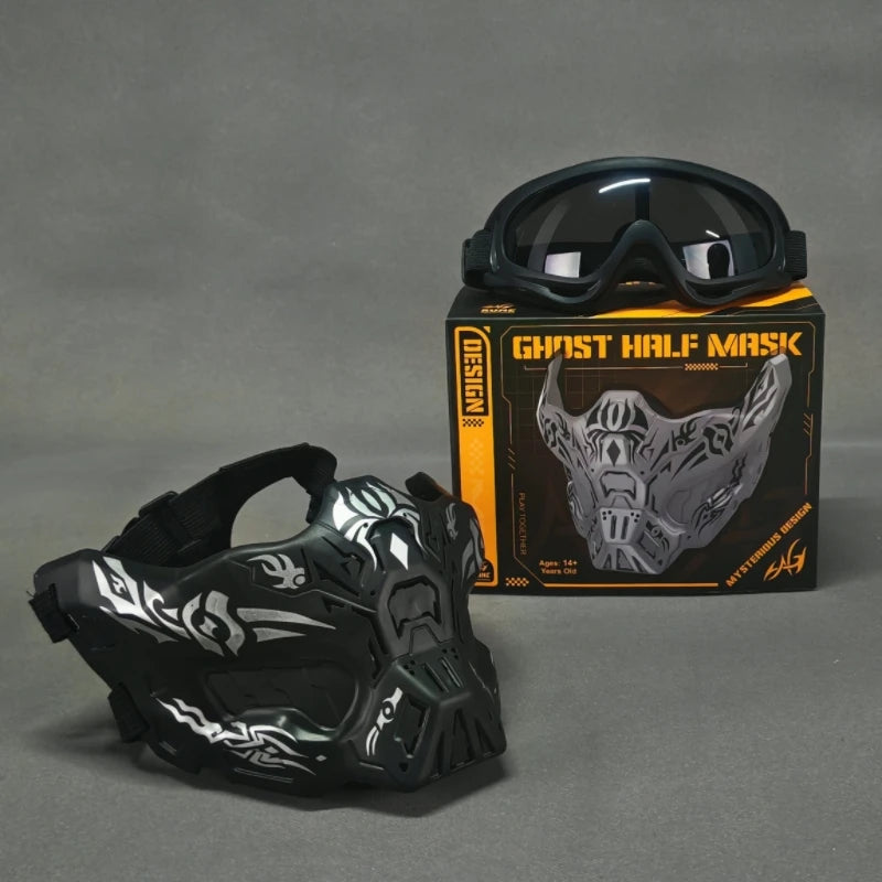 A black tactical silicone half-face mask is displayed next to a pair of black goggles and its packaging.