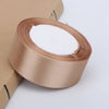 Roll of satin ribbon in beige color for crafts and gift wrapping