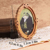 A vintage wooden frame featuring a gentleman frog design, used as a fridge magnet.