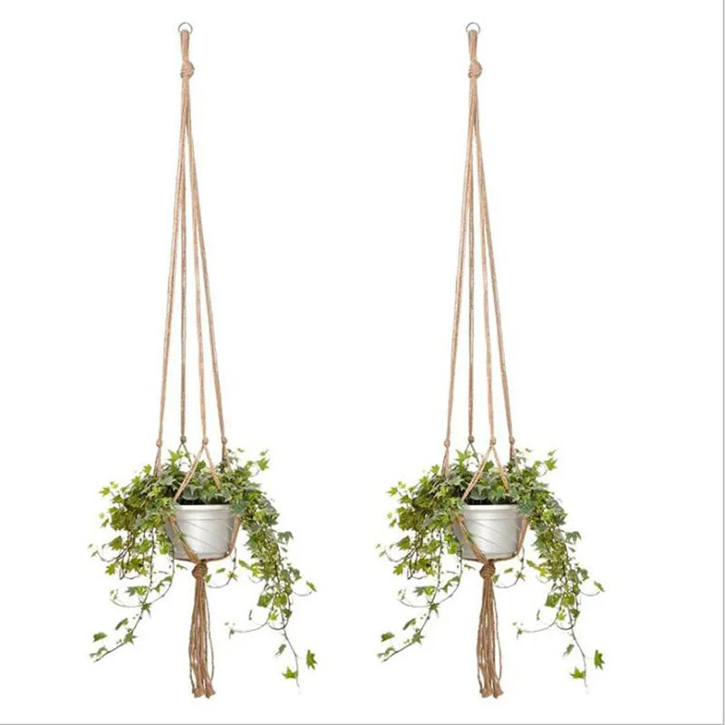 Handmade macrame plant hanger with a woven basket suspended by cotton rope for home and garden use