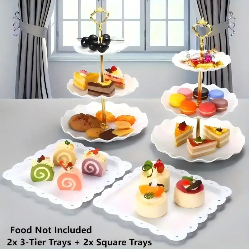 A set of decorative food trays including 2x 3-tier and 2x square white trays displaying various colorful desserts.