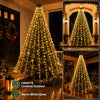A large indoor and covered outdoor Christmas tree decorated with warm white glow lights.