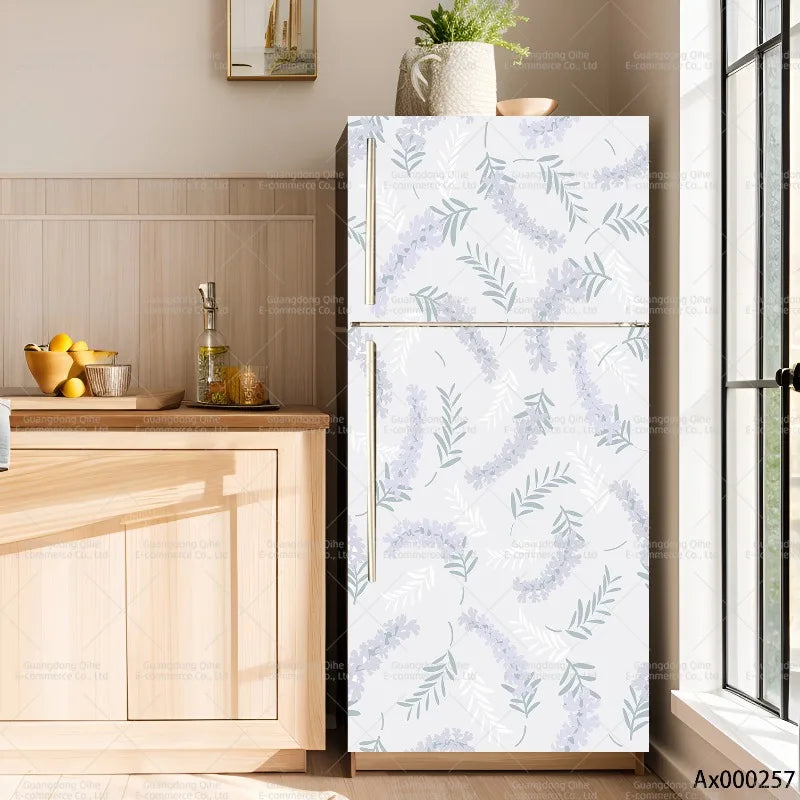 A modern refrigerator featuring a minimalist plant floral decal with light blue leaves on a white background.