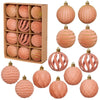 A set of twelve round, textured pink velvet Christmas hanging ornaments in various shades and finishes.