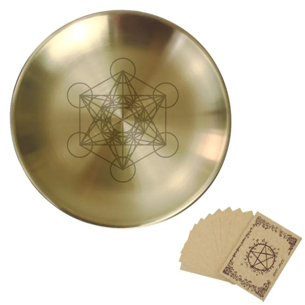 A round, brass-colored stainless steel altar plate featuring an etched pentagram design.