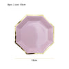 A pink hexagonal plate with a gold rim, shown flat, is part of an 8-piece tableware set.