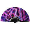 UV fluorescent handheld folding fan with a swirling purple and pink pattern