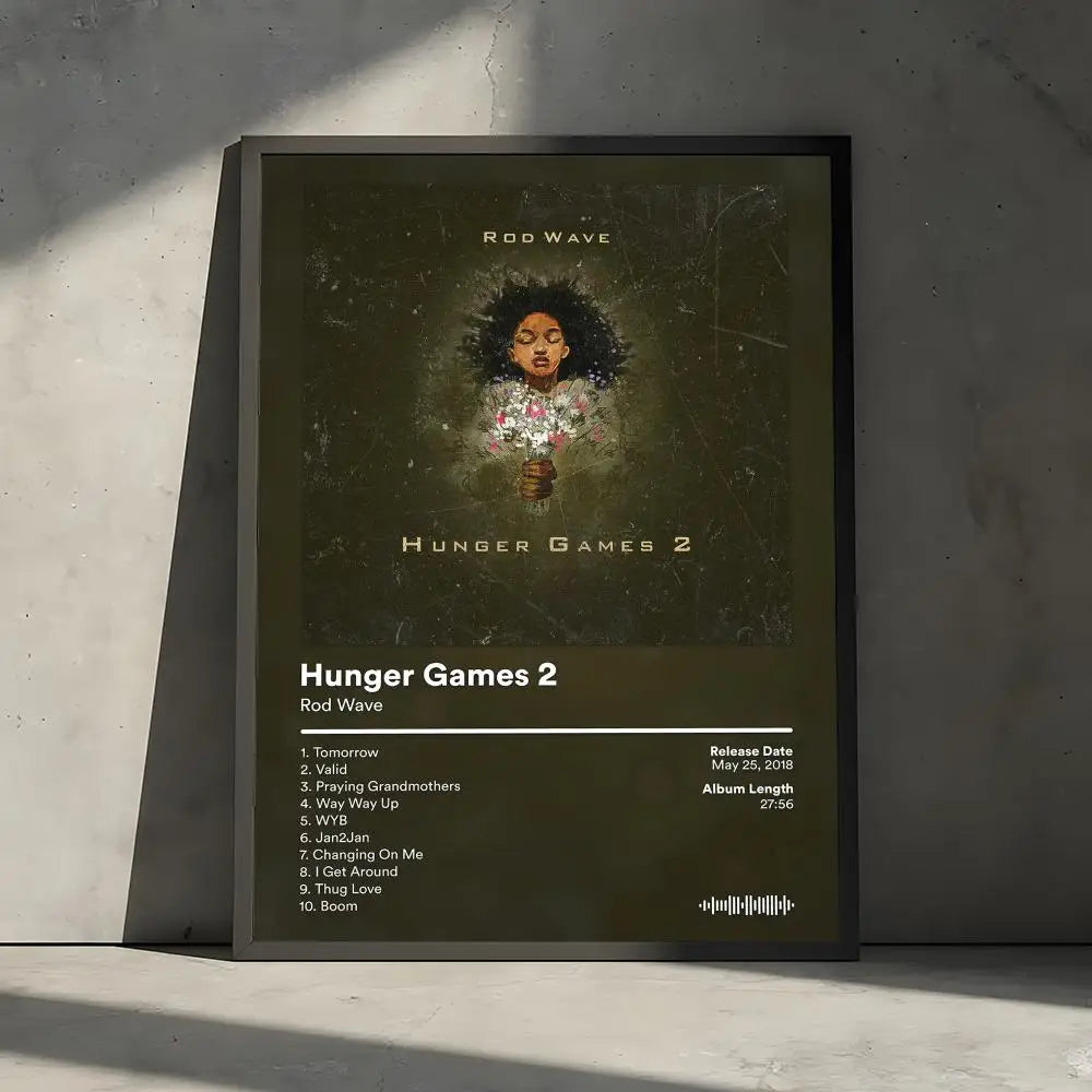 Album cover art for Hunger Games 2 by Rod Wave displayed on a dark framed poster.