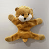 A fluffy brown teddy bear fridge magnet with white facial markings.