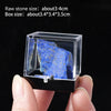 A clear box contains a rough, deep blue natural stone specimen.