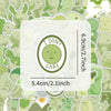 A round sticker featuring a simple face with the text I DON'T CARE on a light green background.