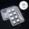 A clear plastic container holds reusable stainless steel ice cubes and a metal scoop for drinks.