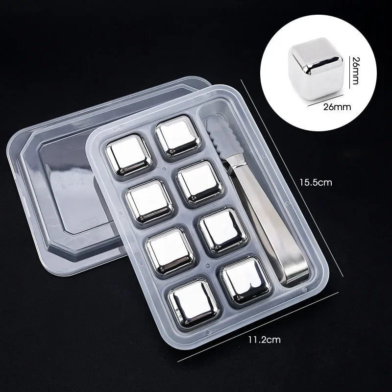 A clear plastic container holds reusable stainless steel ice cubes and a metal scoop for drinks.