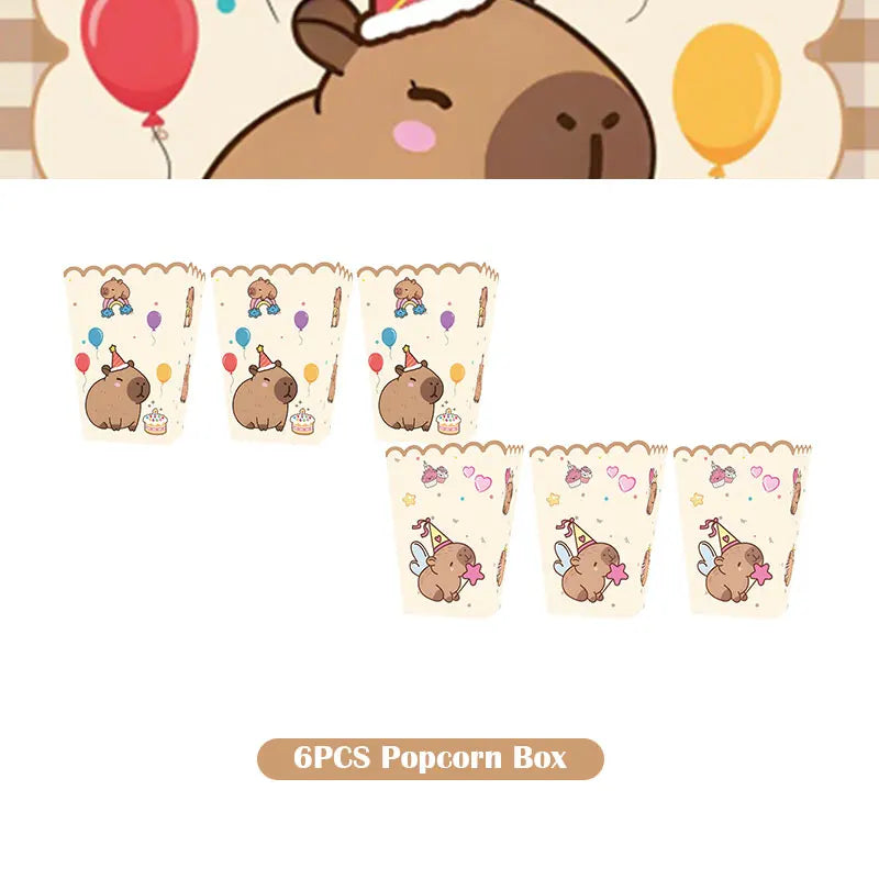 A set of six paper cups decorated with capybara figures for a birthday party box.